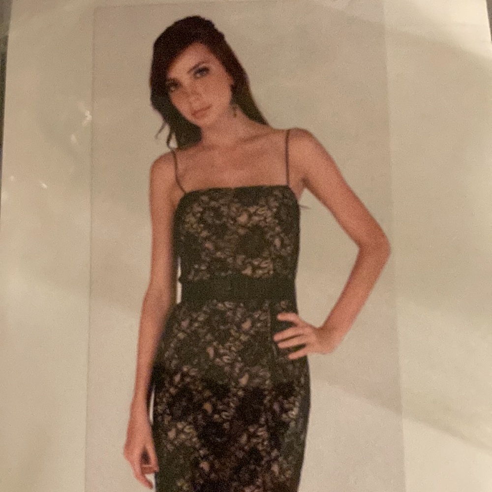 Belted black lace dress
